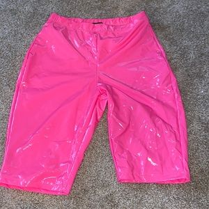Latex material, hot pink, soft material on the inside.
